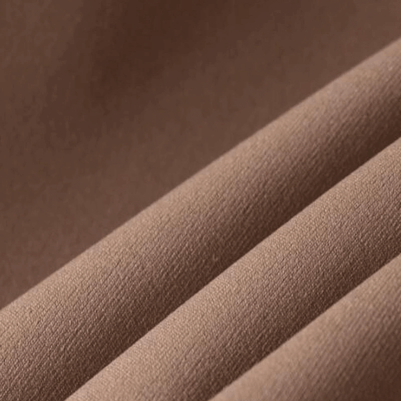 Close-up of soft brown fabric used in women's workout sports sweatshirt.